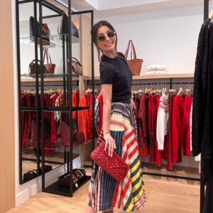 Smiling shopper in trendy outfit